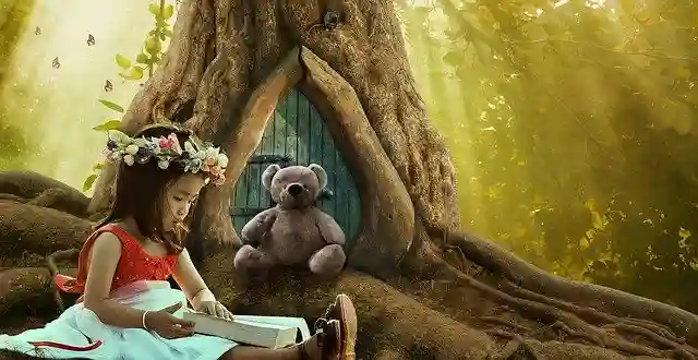 森の中で絵本を読む女の子